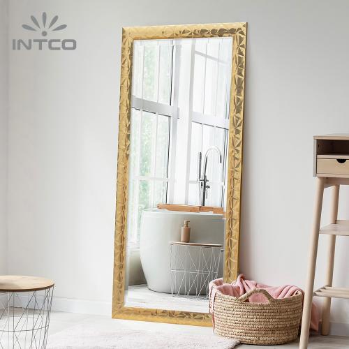 Intco gold full-length mirror is an eye-catching addition to any modern suite